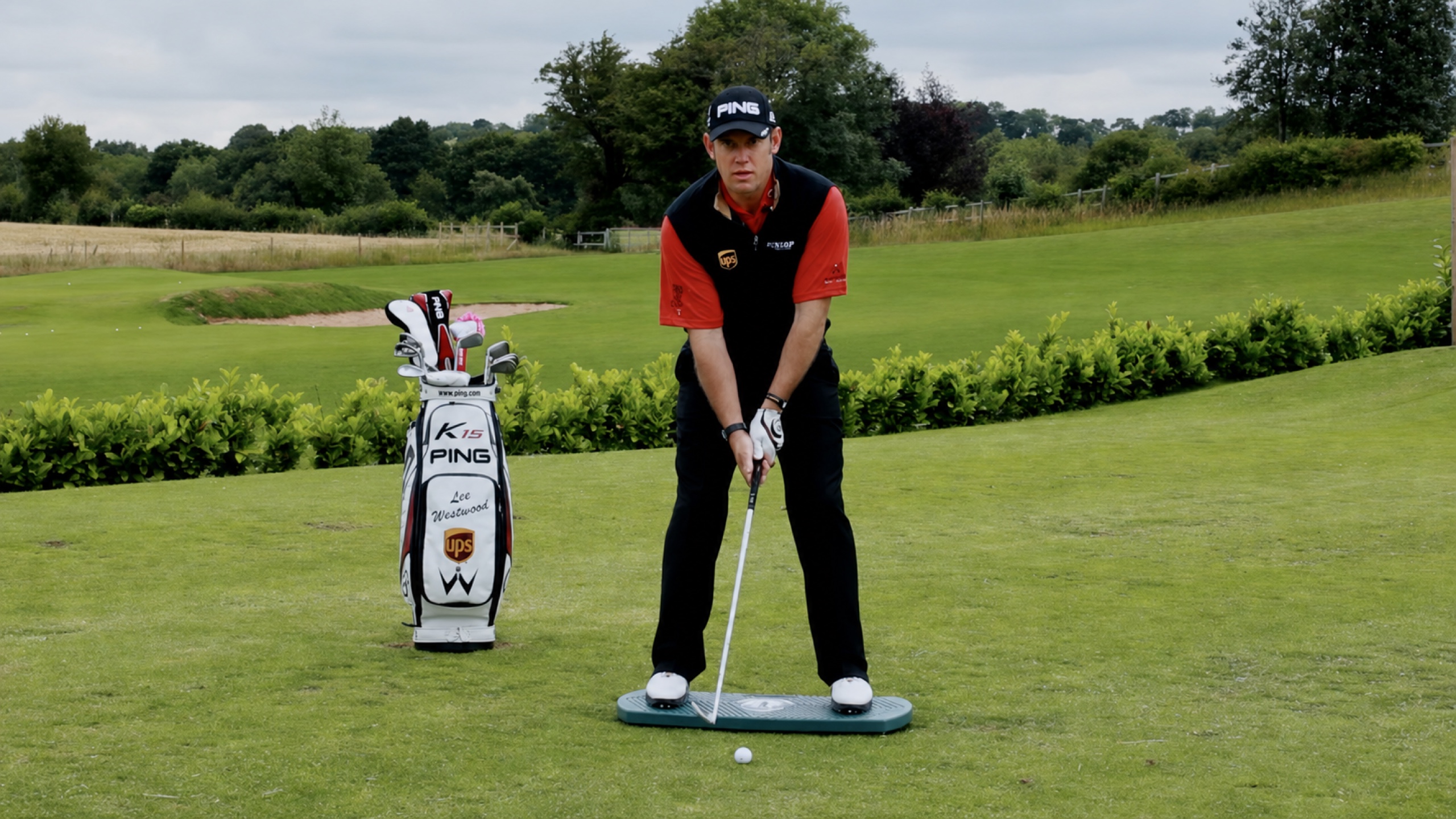 Lee Westwood at address on The Balanced Golfer training board