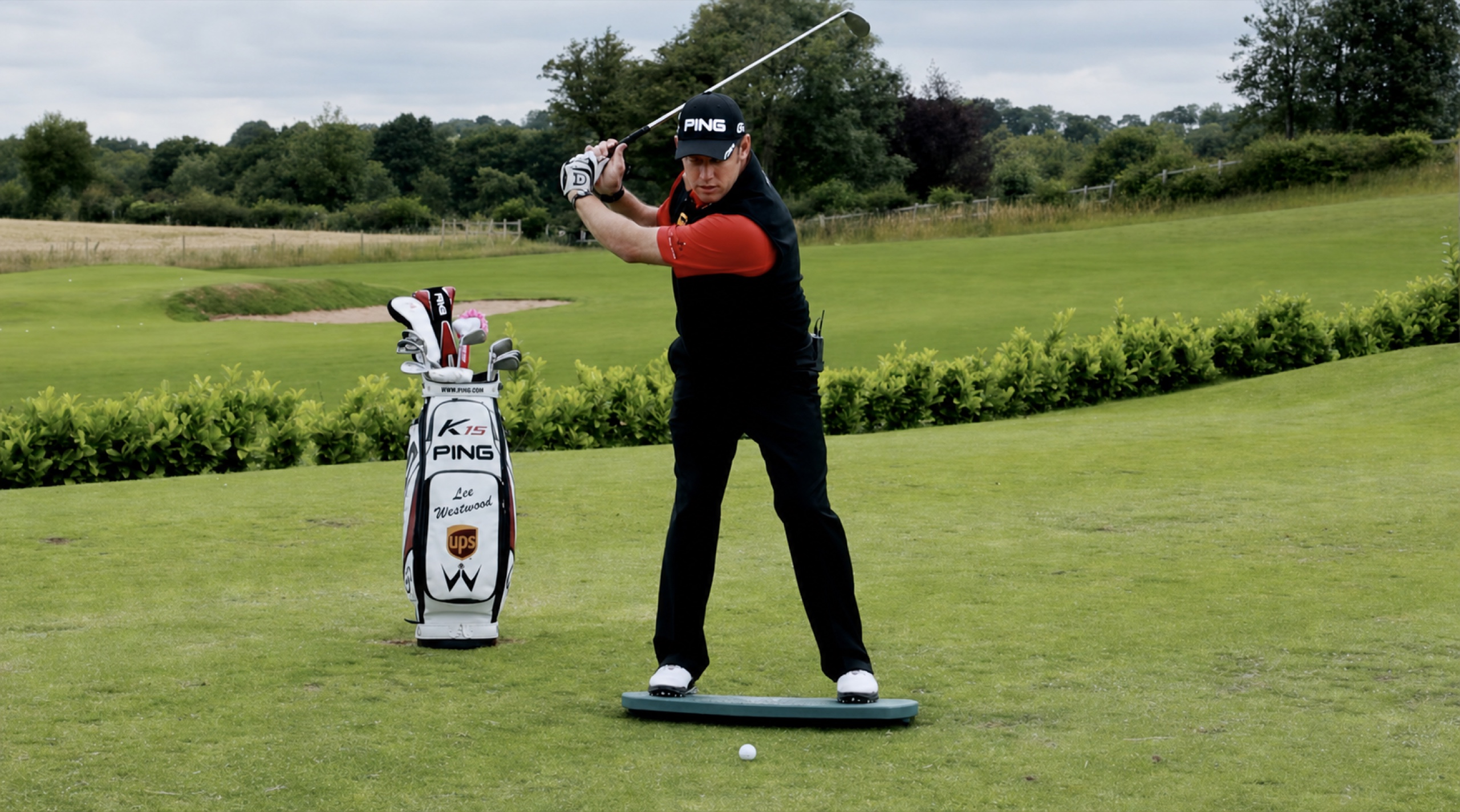 Lee Westwood at the top of his backswing on The Balanced Golfer training board